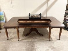 A large Irish mahogany adaptable extending dining / breakfast table, attributed to Mack,