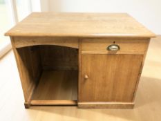 A 1930's oak single pedestal desk, 107 cm x 70 cm x 77 cm.