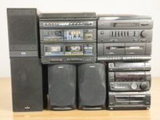 A Sony hi-fi system with pair of speakers, a Philips hi-fi and speakers,