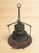 An industrial copper and enameled metal light fitting, height 50 cm.