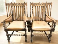 A set of six 1920's oak barley twist dining chairs comprising two carvers and four singles.