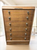 A 20th century oak six drawer chest, 77 cm x 46 cm x 120 cm.