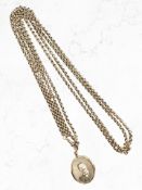 A 9ct gold photo locket on similar muff chain, length 70cm. CONDITION REPORT: 27.