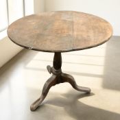 A 19th century oak tripod occasional table, diameter 76 cm.