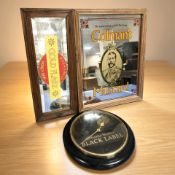A reproduction Colman's picture mirror, height 53 cm,