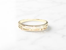 A Greek Key-pattern ring, stamped 585, size U CONDITION REPORT: 1.