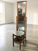 An oak cheval mirror and a mirrored top circular occasional table.