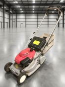 A Honda petrol lawnmower.