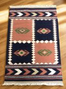 An Eastern Kilim, 147 cm x 94 cm.