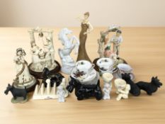 A group of resin and ceramic figures and groups, tea china, Lurpak china, etc.