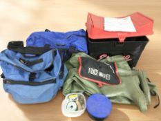 A group of fishing bags, wellies, box, etc.