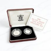 A Royal Mint silver proof 1990 five pence two coin set, with certificate of authenticity.
