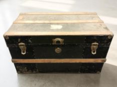 An early 20th century wooden bound trunk, width 88 cm.
