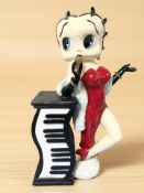 A novelty CD rack in the form of Betty Boop, height 70 cm.