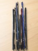 A collection of fishing rods including Daiwa.