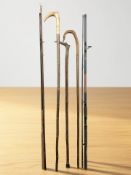 A group of shepherd's crooks, fishing rods, etc.