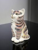A Royal Crown Derby Seated Cat paperweight, gold stopper, boxed.