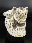 A Royal Crown Derby Koalas paperweight, silver stopper.