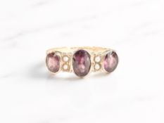 A 9ct gold amethyst and pearl ring, size R CONDITION REPORT: 1.