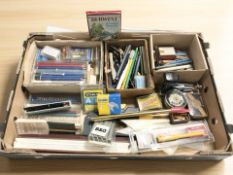 A quantity of rules, pens and pencils, recorder, desk punch, vintage tins, etc.