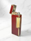 A Dunhill red enamel Rollagas lighter