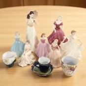 A Coalport Ladies of Fashion figure 'Vicky', five further Coalport ladies,