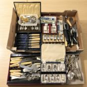 A quantity of EPNS and stainless steel cutlery, some parts boxed.