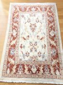 A Zeigler design rug, 206 cm x 128 cm.