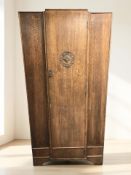 A 1920's oak single door wardrobe, width 92 cm,