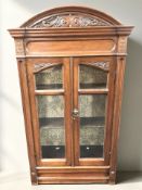 A Victorian carved mahogany double door bookcase cabinet top, height 132 cm.