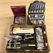 Several canteens of cutlery, a hammered EPNS pedestal fruit bowl, etc.