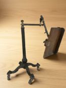 A John Carter literary machine reading stand, on castors.