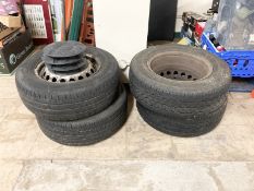 Four car tyres on 16'' hubs