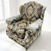 A Victorian-style armchair, width 98 cm.