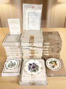 A quantity of boxed collectors plates including Royal Worcester.