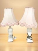 A pair of alabaster table lamps, height 57 cm.