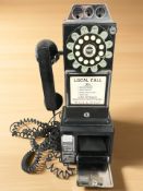 A reproduction model of a payphone, height 44 cm.