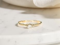 A 9ct gold solitaire diamond ring, size L CONDITION REPORT: 1.