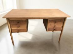 A 20th century teak twin pedestal six drawer desk, 120 cm x 60 cm x 72 cm.