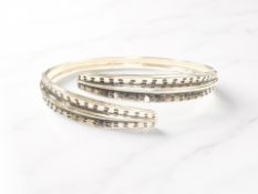 A David Andersen Norway sterling silver 'Saga' bangle, inner diameter 7cm, in original box.