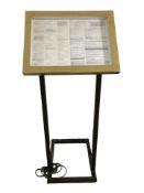 A restaurant menu stand, height 158 cm.