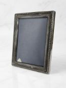 An Elizabeth II silver-mounted easel photograph frame, Mappin & Webb Ltd, Sheffield 1996,