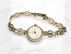 A lady's 9ct gold Accurist quartz wristwatch on 9ct gold integral bracelet CONDITION