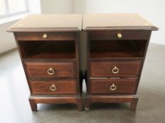 A pair of Stag minstrel bedside chests, width 40 cm.