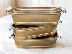 Three copper planters with ceramic handles