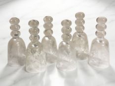 A set of six etched glass stirrup cups, height 11 cm.