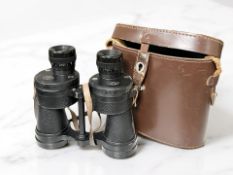 A pair of Ross of London Tropical Seven binoculars No. 28431, with leather case.