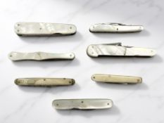 A group of antique mother of pearl and other pocket pen knives.
