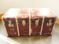 A large early 20th century wooden bound trunk, width 120 cm.