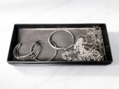 A group of silver / 925 stamped jewellery including three various bangles,